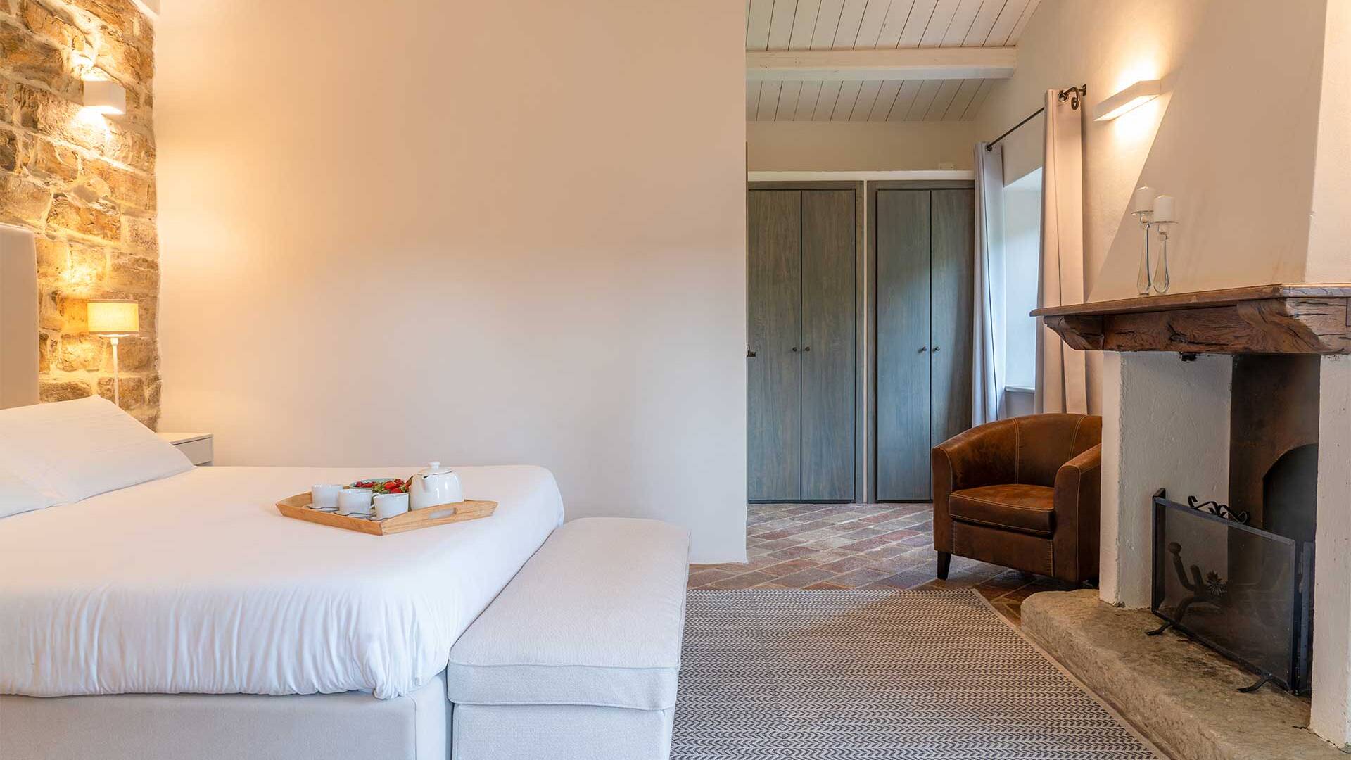 double bedroom with fireplace and en suite bathroom